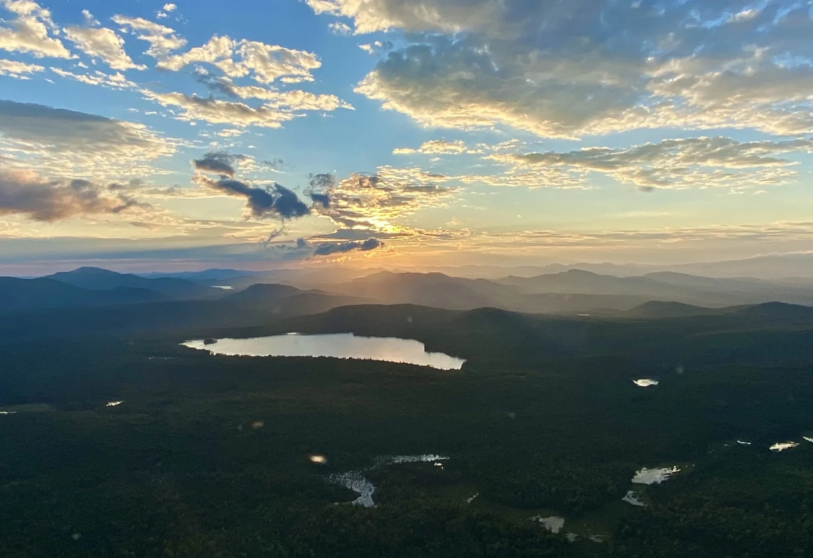 Mountains at sunset with a lake